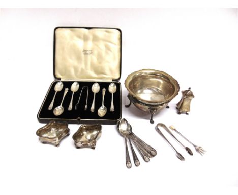 A SILVER SUGAR BOWL on lion mask supports; a pair of silver salts with matching pepper; a cased set of six shell pattern tea 