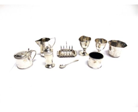 A MINIATURE SILVER TOASTRACK on a tray base; a late Victorian silver cream jug and a sugar bowl by William Hutton & Sons Ltd,
