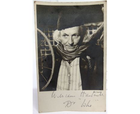 AUTOGRAPHS - WILLIAM HARTNELL (BRITISH, 1908-1975), ACTOR  A black and white portrait photograph of postcard size, showing hi