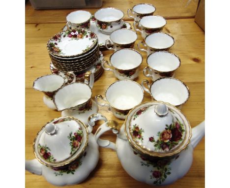 A QUANTITY OF ROYAL ALBERT 'OLD COUNTRY ROSES' TEAWARE  including two teapots, nine cups, eight saucers, six side plates etc.