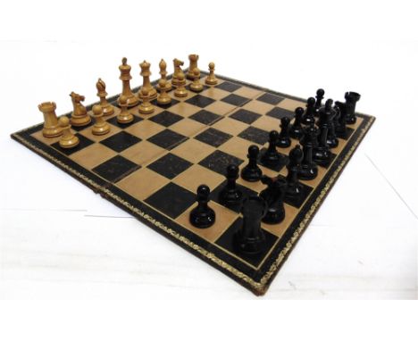 A STAUNTON STYLE CHESS SET  the kings 7cm high, in a mahogany box; together with a set of draughts, boxed; and two folding pl