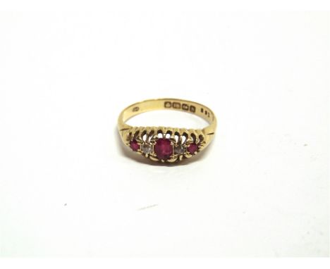 A SYNTHETIC RUBY AND DIAMOND 18 CARAT GOLD RING London 1913, finger size T, 3.4g gross