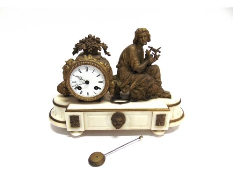 A FRENCH GILT METAL FIGURAL MANTLE CLOCK  the 8-day movement stamped Japy Freres, on shaped alabaster base, 36cm wide