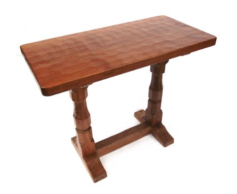 ROBERT 'MOUSEMAN' THOMPSON:  a carved oak side table or dining extension table, with adzed top and signature carved mouse run