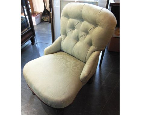 A BUTTON UPHOLSTERED SIDE CHAIR  on acanthus carved mahogany supports with brass casters, 51cm wide 63cm deep 76cm high