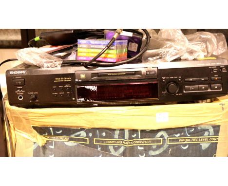 Mini- Disk player Sony MDS-JE520 with remote and unopened packets of mini disks. All electrical items in this lot have been P