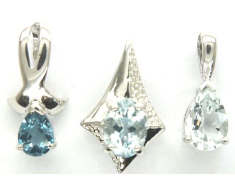 Three white gold pendants, two aquamarine, one blue topaz,  combined gold weight 3.7g. P&amp;P Group 1 (£14+VAT for the first