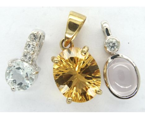 Three 9ct gold pendants: rose quartz, aquamarine and citrine, gold weight 2.9g. P&amp;P Group 1 (£14+VAT for the first lot an