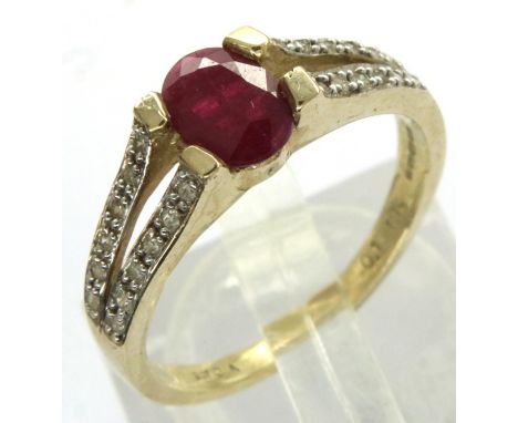 9ct gold ruby ring with diamond set shoulders, size O, 2.8g. P&amp;P Group 1 (£14+VAT for the first lot and £1+VAT for subseq