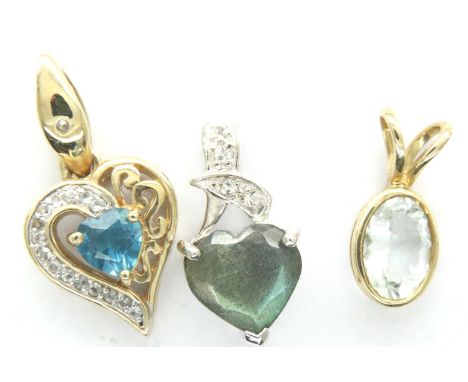 Three 9ct gold pendants: blue and white topaz, aquamarine and labradorite, gold weight 3.8g. P&amp;P Group 1 (£14+VAT for the