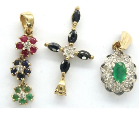 Three 9ct gold pendants set with diamonds, sapphires rubies and emeralds, combined 2.5g. P&amp;P Group 1 (£14+VAT for the fir