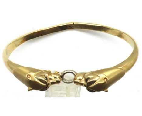 14ct gold hinged double leopard head bangle with stone set eyes, L: 22 cm, 32.6g. Stones are all present with no damage, some