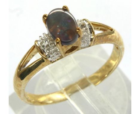 9ct gold Lightning Ridge black opal and white topaz ring, size N, 2.4g. P&amp;P Group 1 (£14+VAT for the first lot and £1+VAT