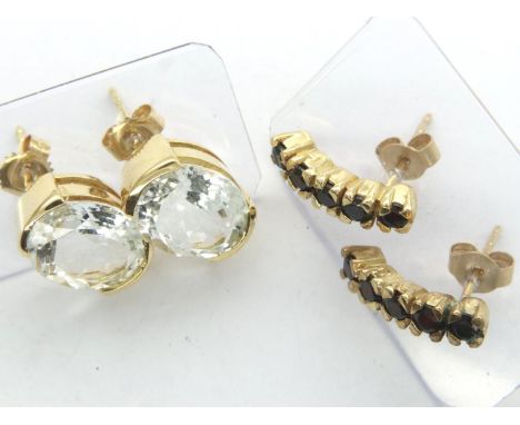 Two pairs of gold earrings, 9ct gold garnet and 18ct gold aquamarine, combined metal weight 4.9g. P&amp;P Group 1 (£14+VAT fo
