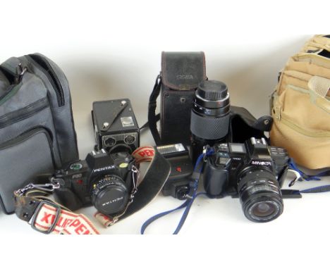 ASSORTED CAMERA EQUIPMENT including Minolta 7000SLR with two zoom lenses, Pentax P30 SLR with sigma zoom lens and a 620 Kodak