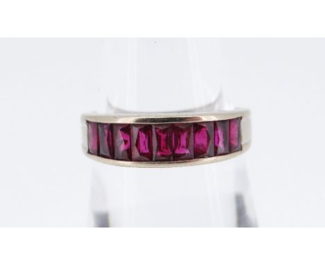 18CT WHITE GOLD NINE-STONE RUBY HALF ETERNITY RING, 3.6gms in boxThe ring is size L/MEach ruby is approximately 3mm x 2mm and