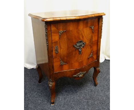 FRENCH-STYLE SERPENTINE WALNUT CUPBOARD with interior shelf and gilt metal mounts