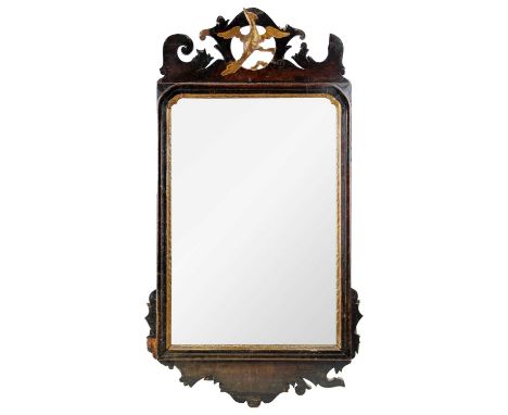 A George III mahogany fretwork wall mirror. With a gilt disheveled bird finial, and moulded gilt slip, height 72cm, width 39c