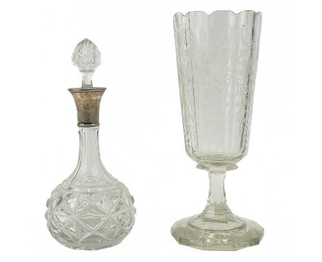 A silver necked cut glass decanter.  London 1920, height 25cm, with cut glass stopper, together with a large acid etched cele