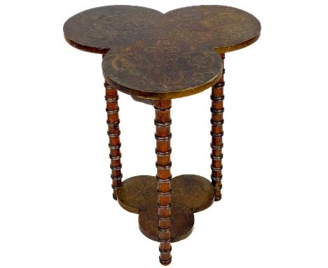 An early 20th century two tier trefoil poker work table. With simulated bamboo supports, height 50cm.Structurally sound, gene