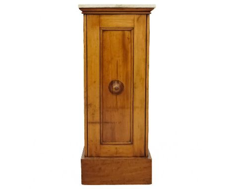 A Victorian mahogany marble top cupboard. The single door with a central handle which opens to reveal a single full shelf rai