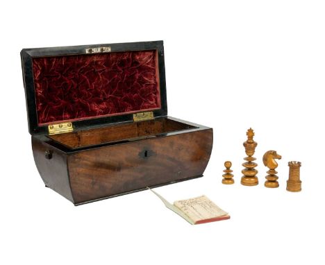 A Lund St George pattern style boxwood and ebony chess set.  Late 19th century, with a mahogany casket and a small competitio