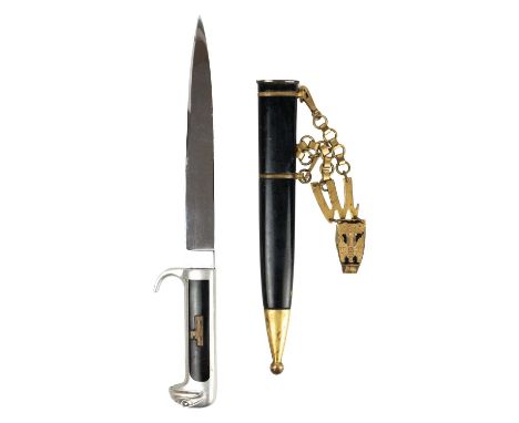 An Italian Officer's MSVN 1937 model dagger. The polished aluminium grip with eagle head pommel and Bakelite insets, with unm