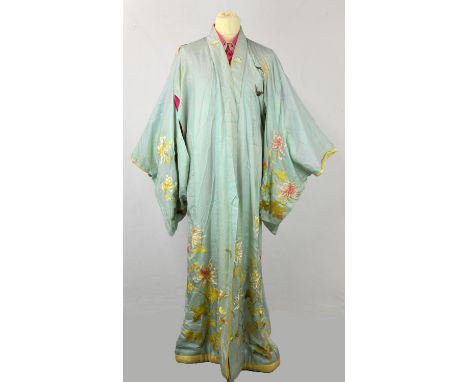 A Japanese formal kimono or GOFUKU dating from c1930 in pale blue and yellow silk with embroidered silk chrysanthemums. made 