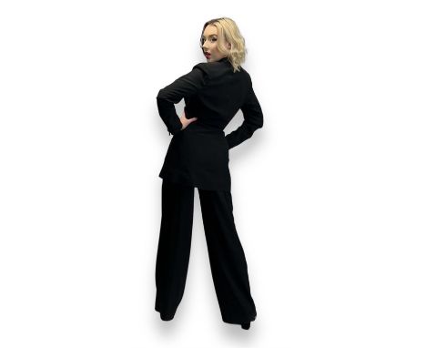 CELINE ladies black tuxedo style trouser suit in slinky fabric, single breasted style jacket with two hip pockets and one but