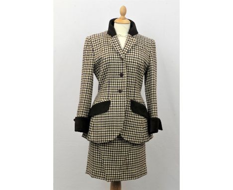 A CELINE ladies brown and cream, two piece single-breasted dogtooth check skirt suit with brown suede collar, cuffs, and hip-