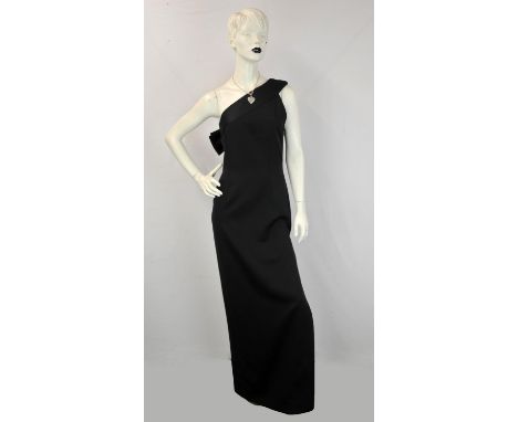 Two items. A CELINE one-shoulder black sleeveless, lined, full-length evening dress, slit to the thigh at one side with black