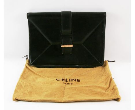 A CELINE black leather envelope clutch handbag with red leather lining and dust bag. Loose screw on fastening. (Needs a back 