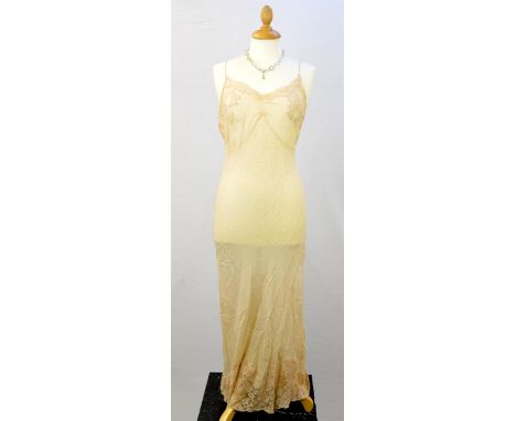 Three items of vintage ladies nightwear. A 1930s pink silk chiffon long nightdress UK10, a 1930s style salmon-pink padded sil