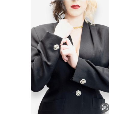 CELINE ladies black two-piece skirt suit. A black collarless V neck tuxedo style jacket with crystal button and two hip pocke