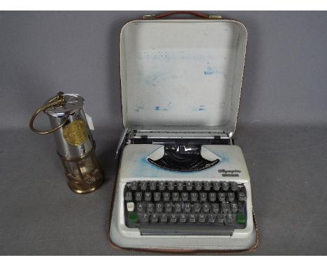 A Protector Lamp &amp; Lighting Co Ltd, Type 6 safety lamp, approximately 25 cm (not including handle), and an Olympia portab