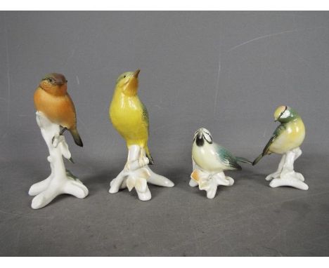 Karl Ens - Four ceramic bird figurines, largest approximately 13 cm (h).