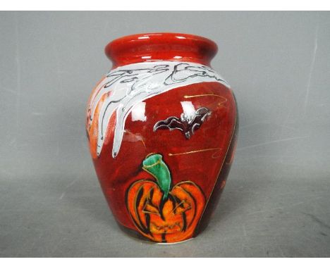 Anita Harris - a ceramic Anita Harris pumpkin vase, 15 cm (h)