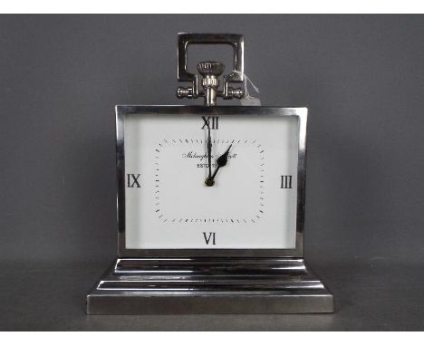A Mclaughlin &amp; Scott chrome plated mantel clock of large scale, approximately 38 cm (h).