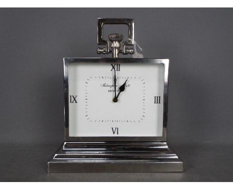 A Mclaughlin &amp; Scott chrome plated mantel clock of large scale, approximately 38 cm (h).