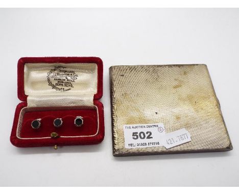 A George V silver cigarette case with engine turned decoration, London assay 1933, sponsors mark for Goldsmiths &amp; Silvers
