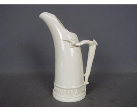 A Royal Worcester ice jug in the form of a tusk with relief moulded 'antler horn' handle, shape 1116, approximately 22 cm (h)