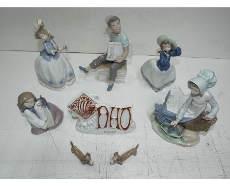 Nao by Lladro - Eight pieces total. All marked stamped / impressed numbers. Tallest is 23cm high. Excellent condition, No dam