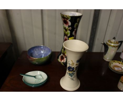 A Purbeck Ceramics vase together with one other floral decorated vase; a Maling and two Carltonware dishes