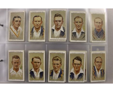Two albums and a box of cigarette cards and cigarette silks depicting flags