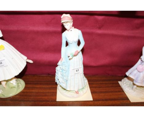 A Royal Worcester figurine 'The Bustle' with certificate of authenicity