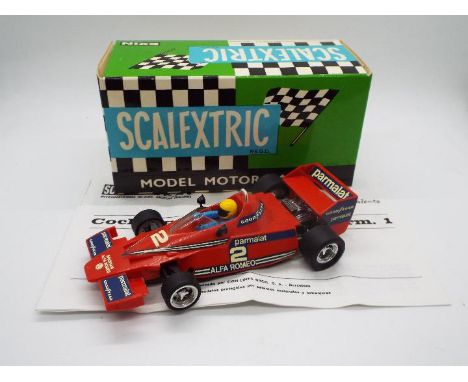 Scalextric Exin (Spain) - A boxed Scalextric Exin #4056 Brabham Formula 1 BT-46. The model in red appears to be in Excellent 