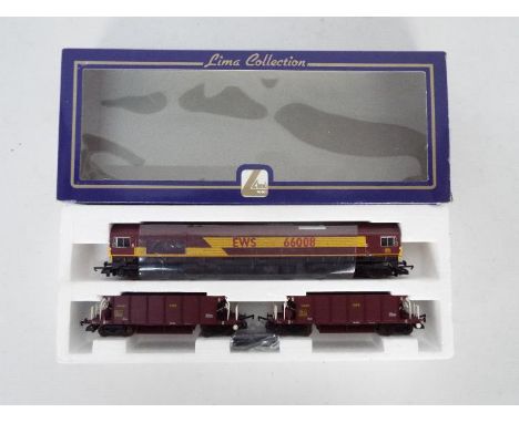 Lima - A boxed OO gauge Lima L149967 set containing a Class 66 diesel locomotive Op.No.66008 in EWS livery with two YGA 'Seac