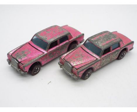 Hot Wheels - Redline - 2 x rare UK only Pink Rolls Royce Silver Shadow models. They appear in Fair condition both showing sig