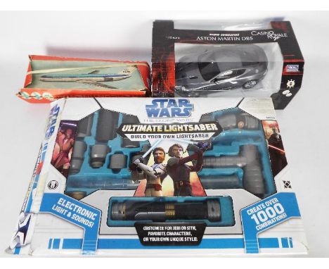 Nikko, Hasbro, Other - Three boxed toys. Lot includes a Nikko 1:16 scale 'Casino Royale' Aston Martin DBS radio controlled ca
