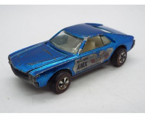 Hot Wheels - Redline - A rare UK only Ed Shaver Custom AMX in Blue. The car shows signs of play wear and has some damage wher